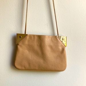 Faux leather and rose gold crossbody bag.